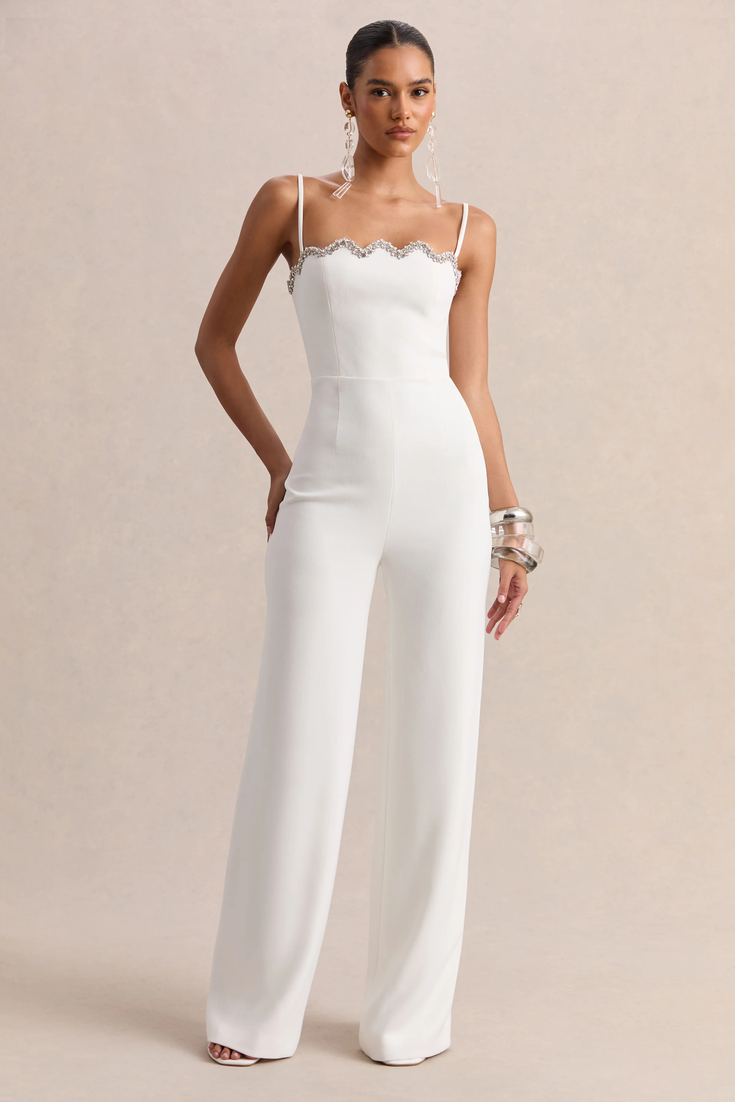 Calira | Witte Jumpsuit Met Vierkante Hals En Geschulpte Details