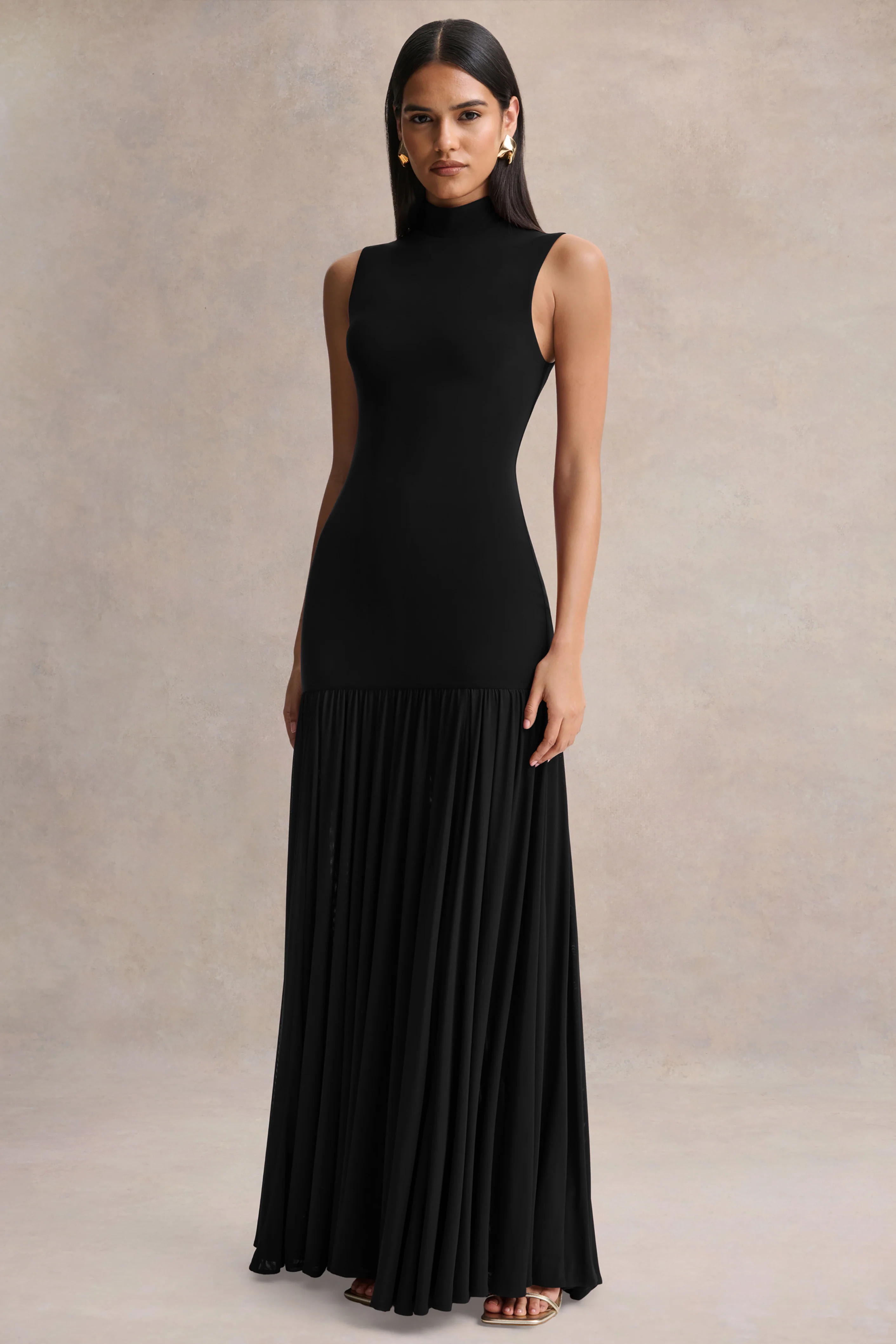 Gigi | Zwarte Hoge Hals Maxi Jurk Met Verlaagde Taille En Doorzichtige Rok