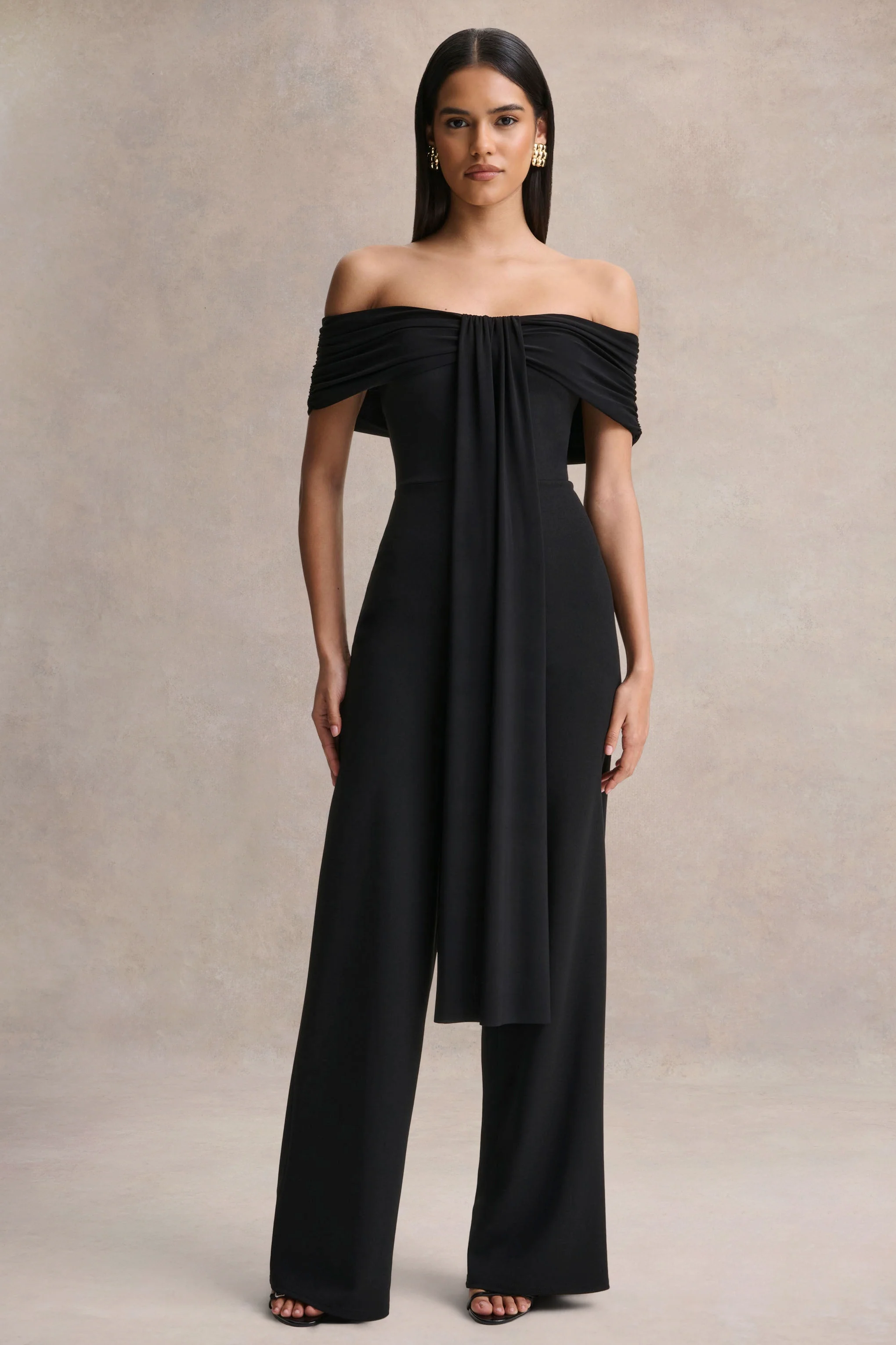 Kalida | Zwarte Bardot Hals Jumpsuit Met Ceintuur Detail