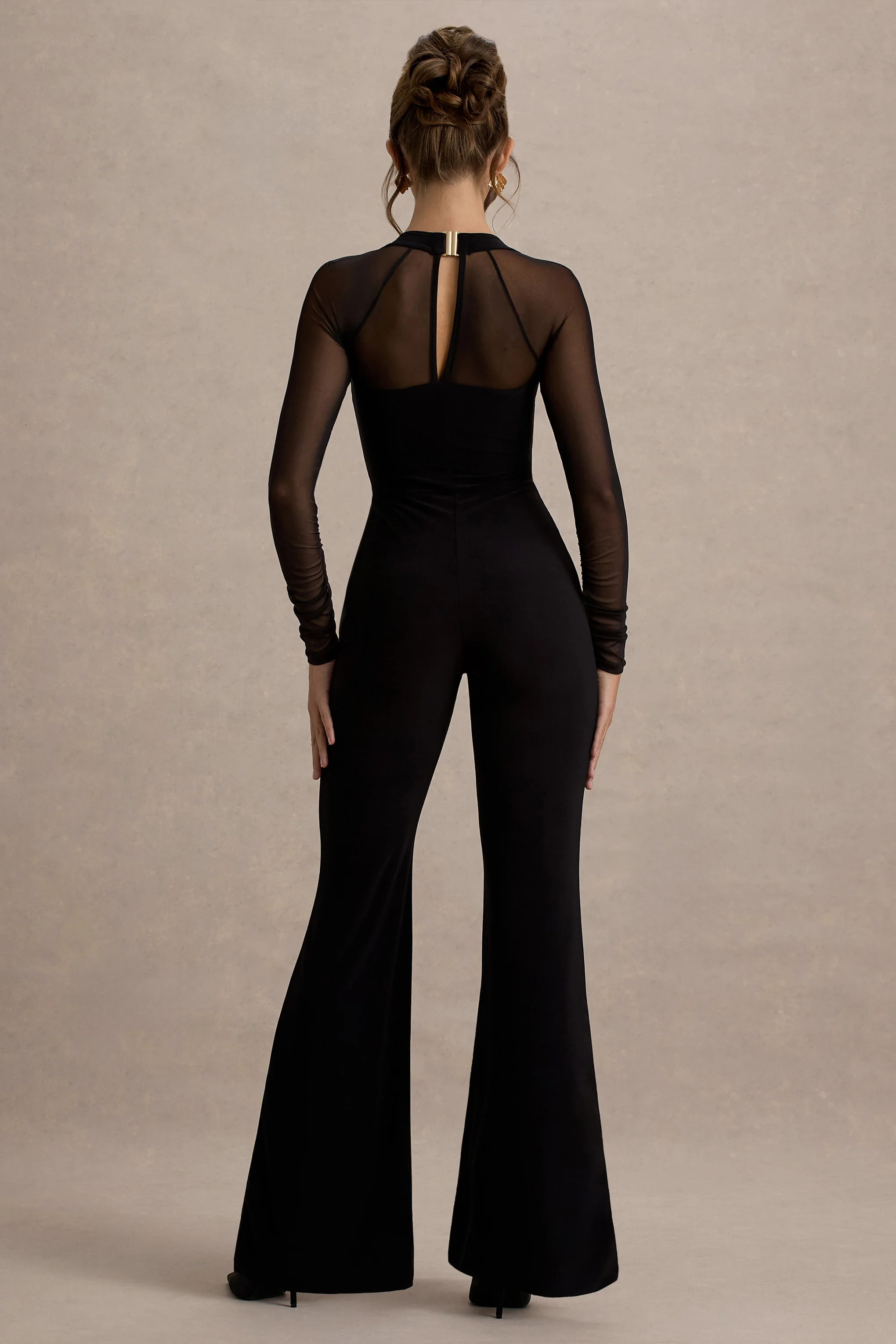 On Track | Zwart Jumpsuit Met Uitlopende Pijpen En Doorzichtige Mouwen - Image 2