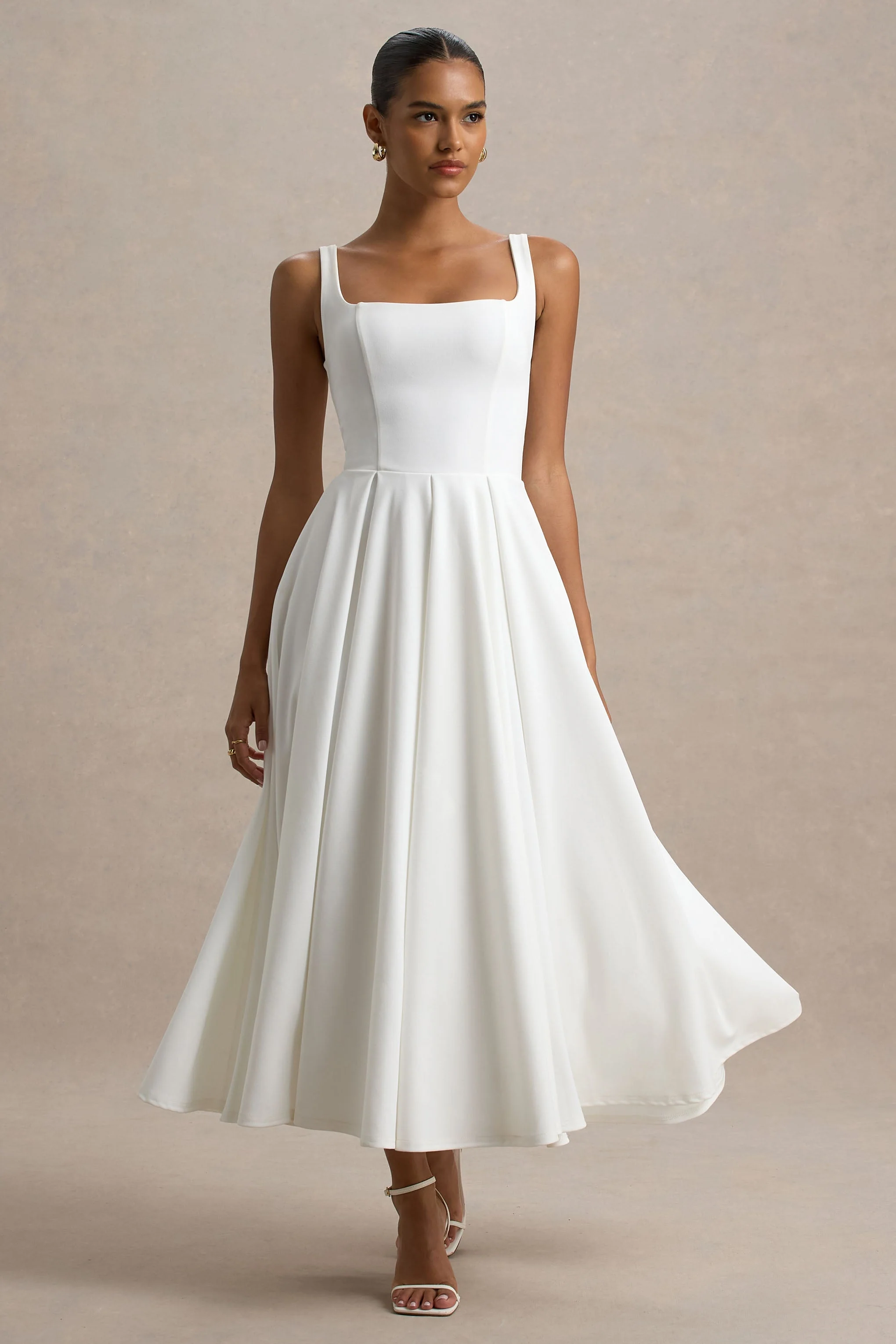 Parina | Witte Midi Jurk Met Volumineuze Hem