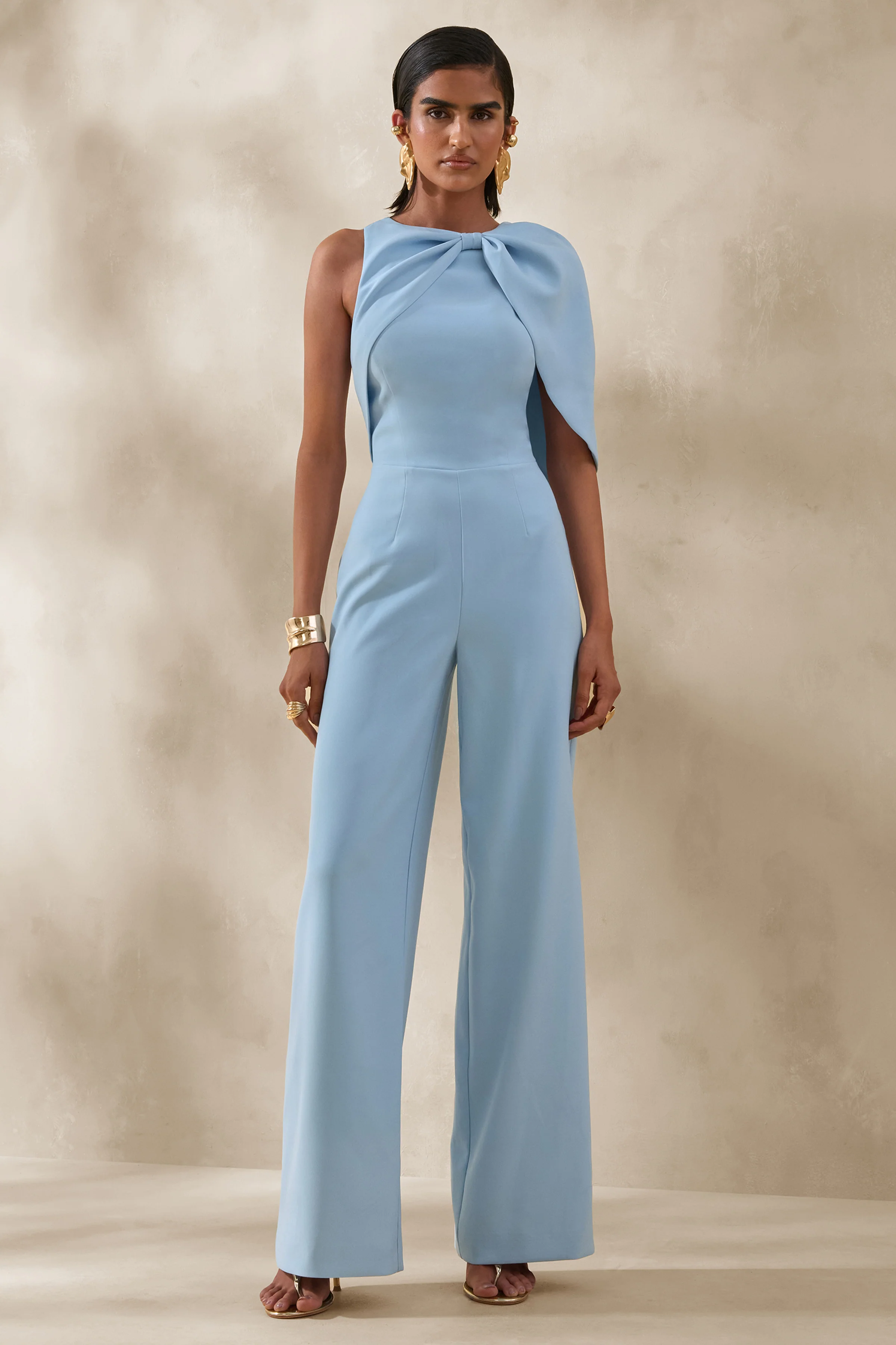 Quinley | Poederblauwe Jumpsuit Met Asymmetrische Hals En Cape Mouwen